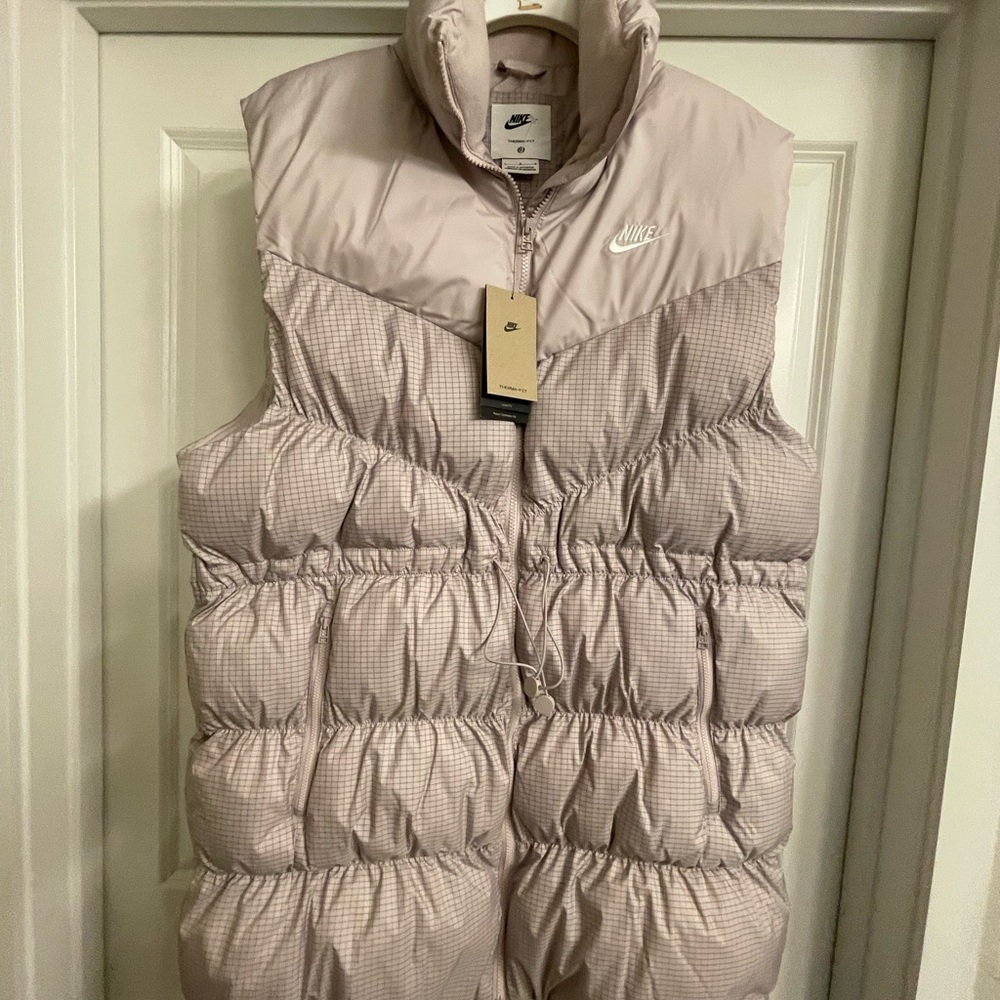 Nike Pale Lavender Puffer Jacket with High Collar and Quilted Design